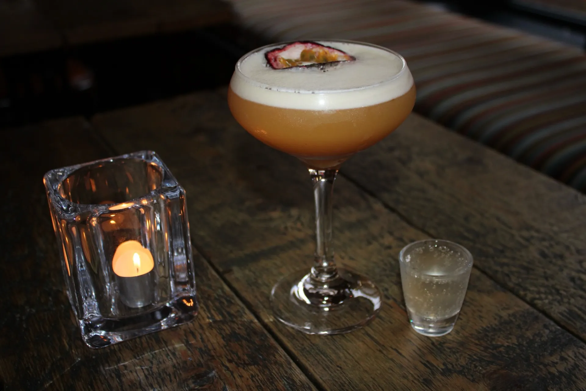 Expert mixologist crafting cocktails at Gin Can